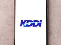 West Bangal, India - October 09, 2021 : KDDI logo on phone screen stock image.