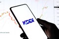 West Bangal, India - October 09, 2021 : KDDI logo on phone screen stock image.