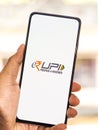 West Bangal, India - September 28, 2021 : e-Rupi logo on phone screen stock image. Royalty Free Stock Photo