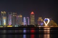 Doha, Qatar - December 6, 2022: The West Bay city skyline at night, Doha, Qatar. Royalty Free Stock Photo