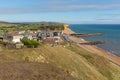 West Bay Dorset uk view to east of the Jurassic coast on a beautiful summer day with blue sky Royalty Free Stock Photo