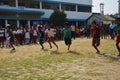 Boys competing in sports in a village school