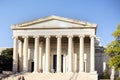 west building of the National Gallery of Art with tourists on the stairs on a sunny day in Washington D.C Royalty Free Stock Photo