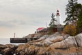 West Coast BC Canada granite rock cliff lighthouse Royalty Free Stock Photo