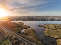 West coast of Ireland. Aerial drone top down view. Green fields and rocky shore. Rocks under water make foot print shape or