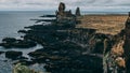 West coast sea cliffs of Snaefellsnes Peninsula. beautiful picturesque icelandic coast cliff with volcanic stone Royalty Free Stock Photo