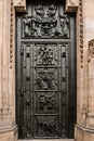 West facade of the Cathedral of Saints Vitus built in the 14th century. Front door with decor, Prague, Czech Republic Royalty Free Stock Photo