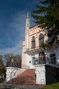 west facade, staircase with lion sculptures guard entrance, coquina towers, Cherniatyn, Ukraine