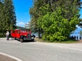 A vintage looking tour bus in Glacier National Park near Lake McDonald and Apgar Campground Royalty Free Stock Photo