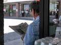 Senior Asian Man Reading Newspaper Royalty Free Stock Photo