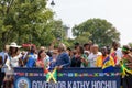 West Indian Labor Day Parade. Al Sharpton, Kathy Hochul, and Stacey E Plaskett walking with people.