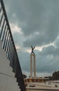 West Irian Liberation Monument located in the middle of the bull field with a view of the cloudy sky