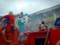 West Kalimantan,Indonesia - 8 Juni 2019,4 houses burned down and the Firefighters extinguish a raging fire in a indonesia house