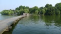 West lake with stone bridge