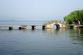 West lake with stone bridge Royalty Free Stock Photo