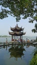 West lake with traditional buildings