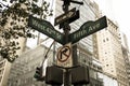 West 42nd Street, Fifth Ave, One way, No turn signs and traffic light on the pole in old vintage style