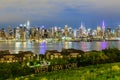 West New York City midtown Manhattan skyline view from Boulevard East Old Glory Park over Hudson River at dusk. Royalty Free Stock Photo