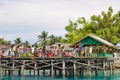 Group of asian indigenous children on a pier looking at camera Royalty Free Stock Photo