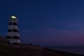 West Point Lighthouse at dusk Royalty Free Stock Photo