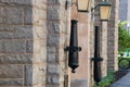 Cannon barrels mounted to the stone wall near the door of an historic building on the campus of the West Point Military Academy Royalty Free Stock Photo