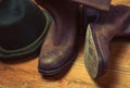 West rodeo cowboy dirty and used brown botts and hat Royalty Free Stock Photo