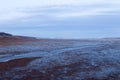 Quebec City and LÃÂ©vis in the distance seen from the Island of OrleansÃ¢â¬â¢ tidal flats during an blue hour dawn Royalty Free Stock Photo