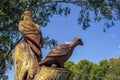 Chainsaw tree sculpture of a wedge tailed eagle and mallee fowl in public park