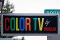 Old fashioned Color TV by RCA sign outside of a motel advertising their amenities Royalty Free Stock Photo