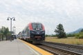 Westbound Amtrak Empire Builder at platform at Leavenworth Station WA