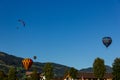 Westendorf, Tirol/Austria - September 27 2018: Three single seat small hot-air balloons flying low over Westendorf village