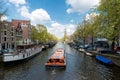 Westerkerk church with cruise ship in Amsterdam, Netherlands.