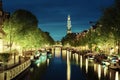 Westerkerk church tower at canal in Amsterdam Royalty Free Stock Photo