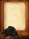 Western background with cowboy clothes and old paper for text Royalty Free Stock Photo