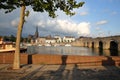 The Western banks of the Meuse river at sunset with Wyck neighborhood  Sint Martinuskerk church and  the bridge Sint Servaasbrug Royalty Free Stock Photo