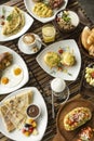 Western big gourmet breakfast selection mixed dishes on restaurant table Royalty Free Stock Photo