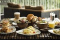 Western big gourmet breakfast selection mixed dishes on restaurant table Royalty Free Stock Photo