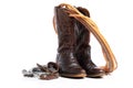 Western boots and a lap or lariat rope and spurs on a white background Royalty Free Stock Photo