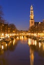 The Western Church and a canal in Amsterdam at night Royalty Free Stock Photo