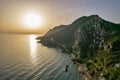 Western Corfu sunset coast with Mirtiotissa beach, Greece Royalty Free Stock Photo