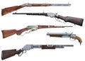 Western cowboy rifle and shotgun booster pack 2 collection of assorted weapons on an isolated white background . Royalty Free Stock Photo