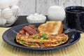 Western Omelet breakfast with toast and bacon. Selective focus Royalty Free Stock Photo