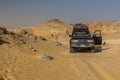 WESTERN DESERT, EGYPT - FEBRUARY 6, 2019: 4WD vehicle at the Crystal Mountain in the Western Desert, Egy Royalty Free Stock Photo