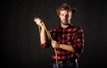 Western life. Man unshaven cowboy black background. Man wearing hat hold rope. Lasso tool of American cowboy. Lasso used Royalty Free Stock Photo