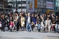 A western man surrounded by Japanese people