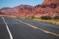 Western road at sunset, Desert highway of the American southwest. Royalty Free Stock Photo