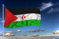 Western Sahara national flag waving in the wind against deep blue sky. International relations concept