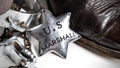 Western themed United States Marshall badge with cowboy boots and spurs Royalty Free Stock Photo