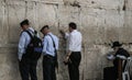 Western Wall, Jerusalem, 03.04.2015, Man sticking a note into th