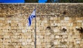 Western Wall in Jerusalem with Flag of Israel.Western Wall as it is known in the West as the Wailing Wall or Kotel in Israel Royalty Free Stock Photo